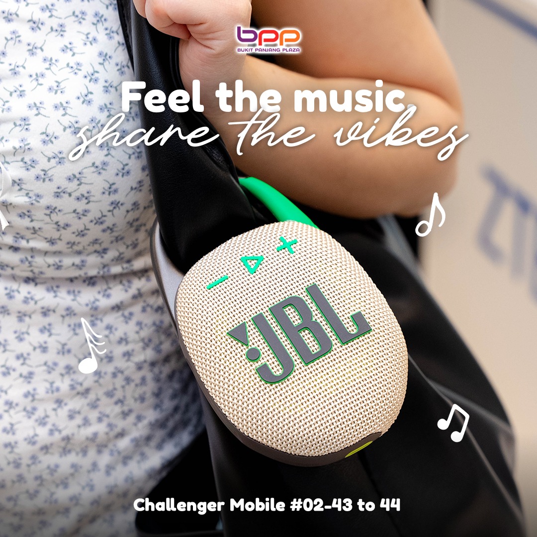 JBL portable speaker providing powerful audio at a vibrant social gathering.