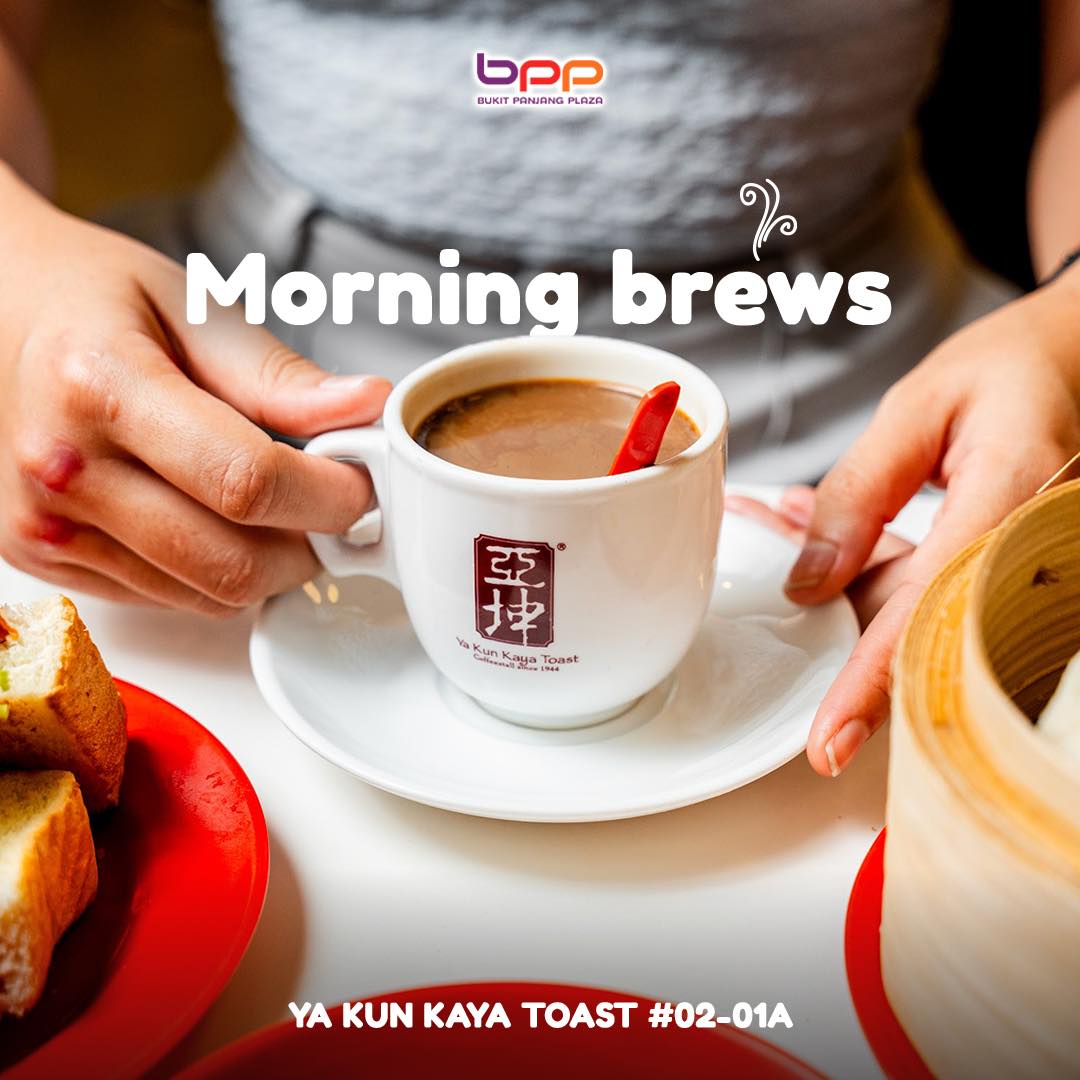 A delicious breakfast spread featuring kaya toast and coffee, perfect for starting the day.