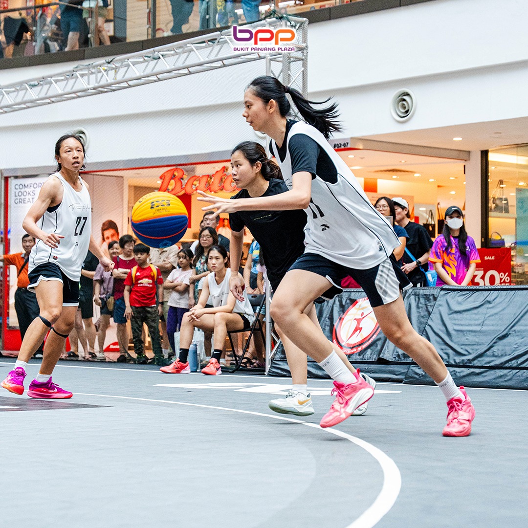 A player executing a powerful dunk at Bukit Panjang Plaza