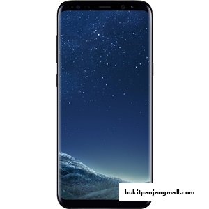 A black smartphone displaying a starry night sky and a mountainous landscape on its screen.