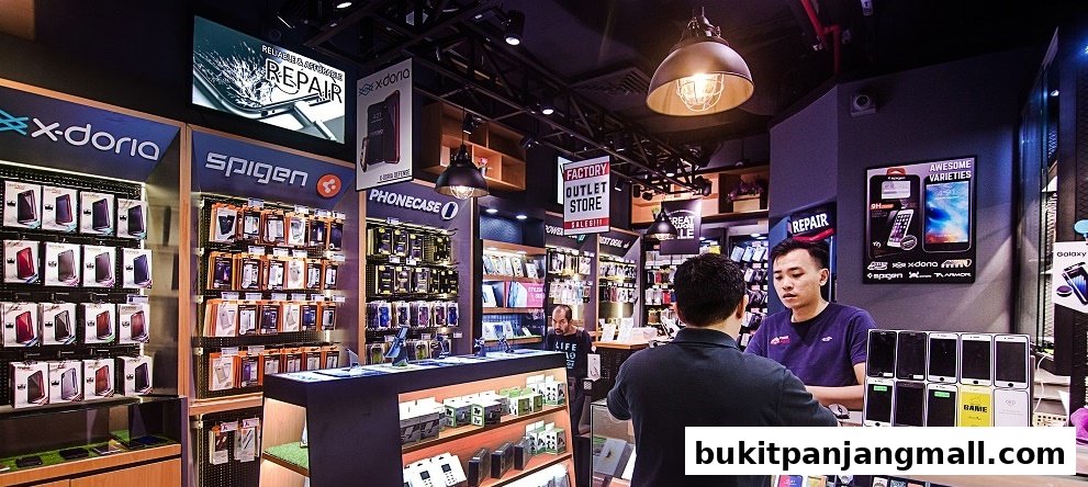 Interior of a phone repair and accessories shop with displays of phone cases and repair services.