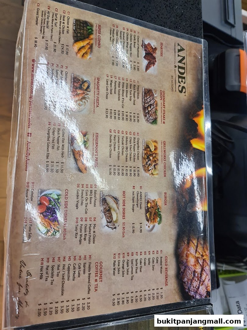 A menu for ANDES by ASTONS featuring steaks, chicken, seafood, sides, and beverages.