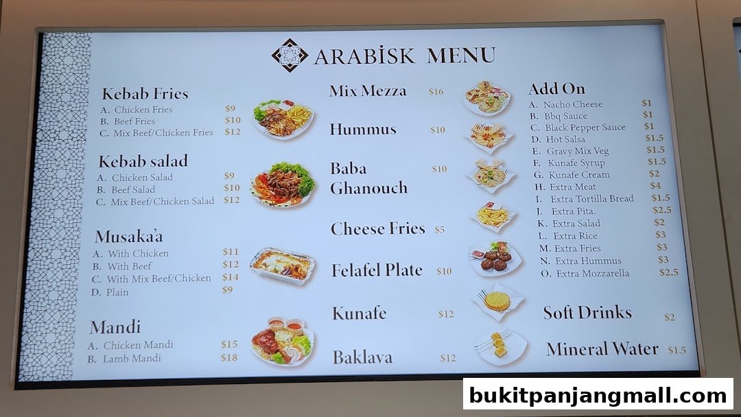 A digital menu board displaying various Arabic food items and their prices.