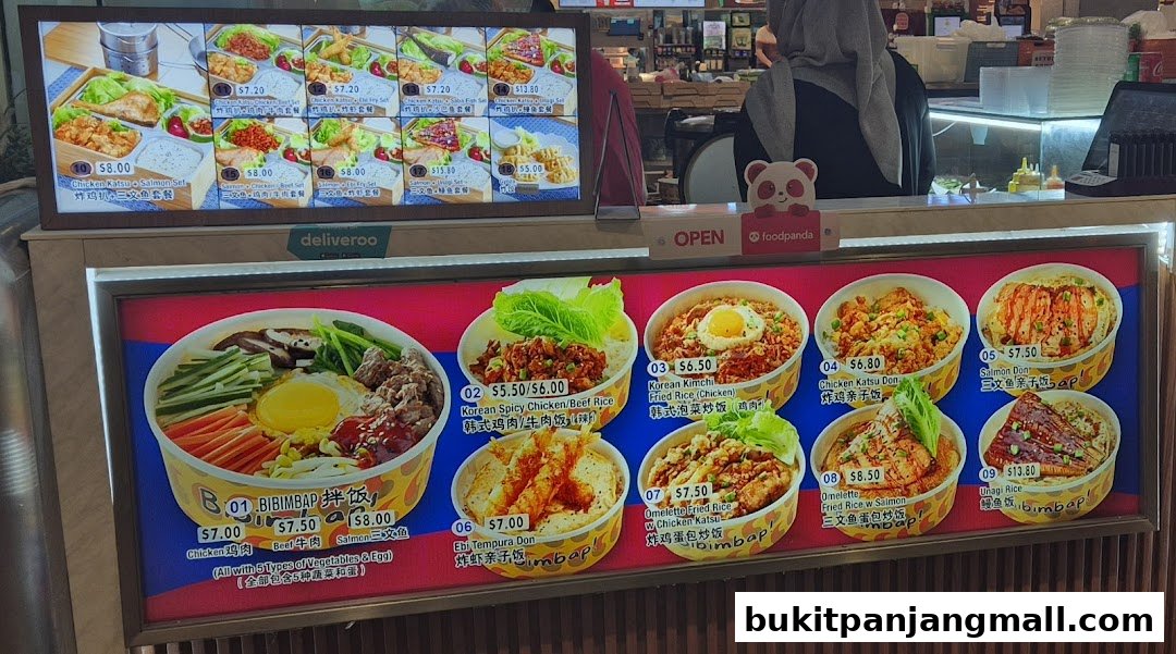 A brightly lit menu board showcasing various Korean rice bowls and sets.