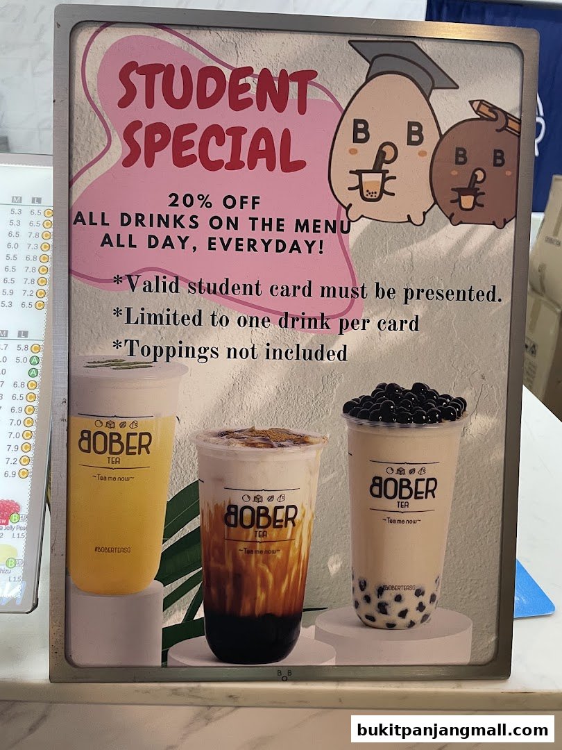 A sign advertising a student special at Bober Tea with drinks and cartoon characters.