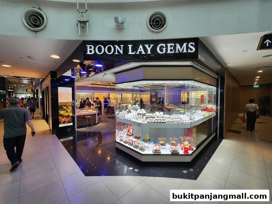 The Boon Lay Gems shop front displays a wide variety of jewelry in glass cases.