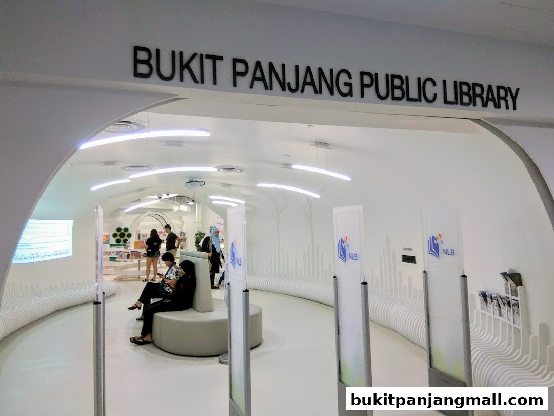 Interior of Bukit Panjang Public Library with people browsing and sitting.