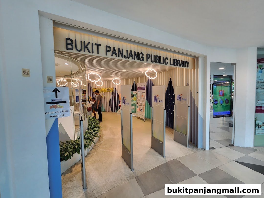 The entrance to Bukit Panjang Public Library, featuring signage and a bookdrop.