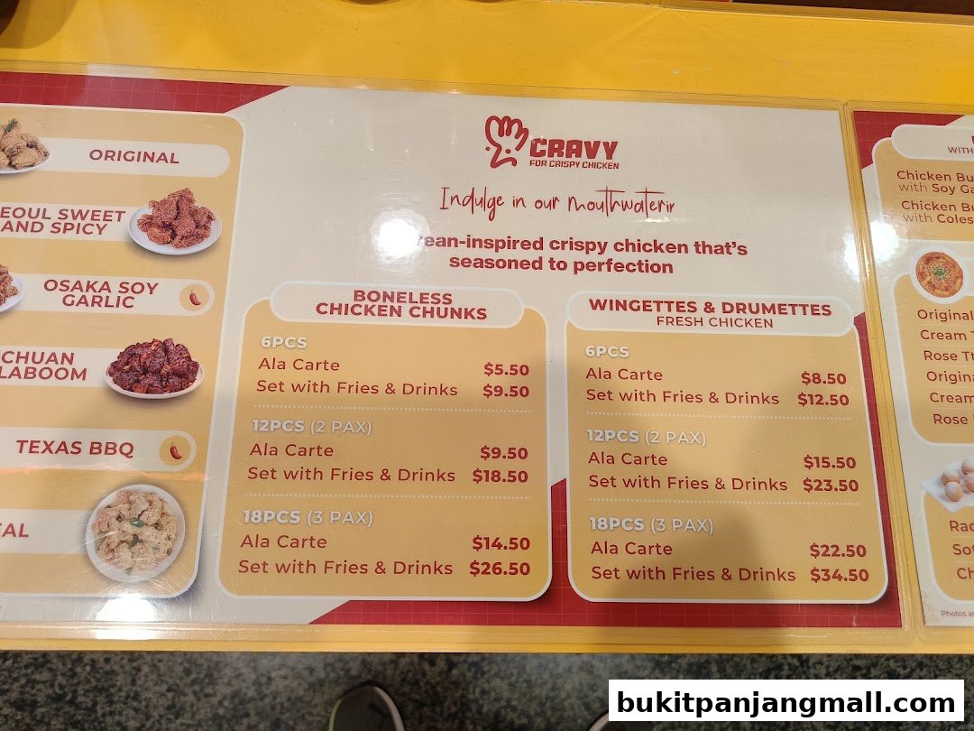 A menu board for Cravy Chicken featuring various Korean fried chicken options and sets.
