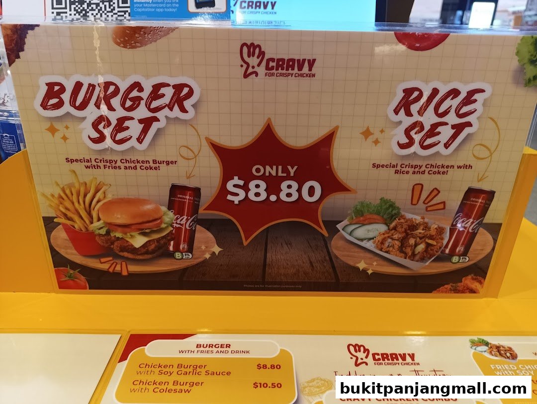 A promotional display for Cravy Chicken featuring a Burger Set and Rice Set meal deal.