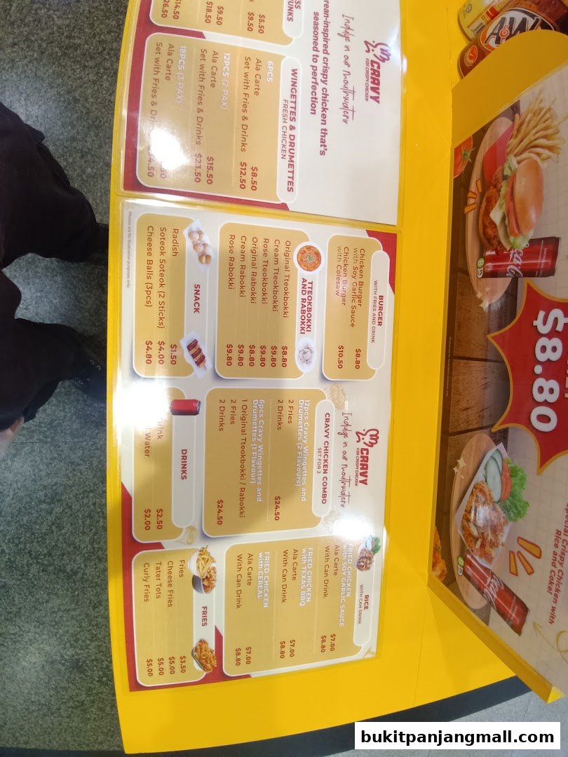 A menu for Cravy Chicken featuring Korean fried chicken, burgers, and sides.