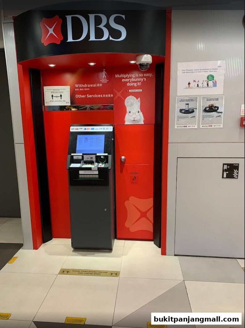 A DBS ATM with social distancing markers on the floor.