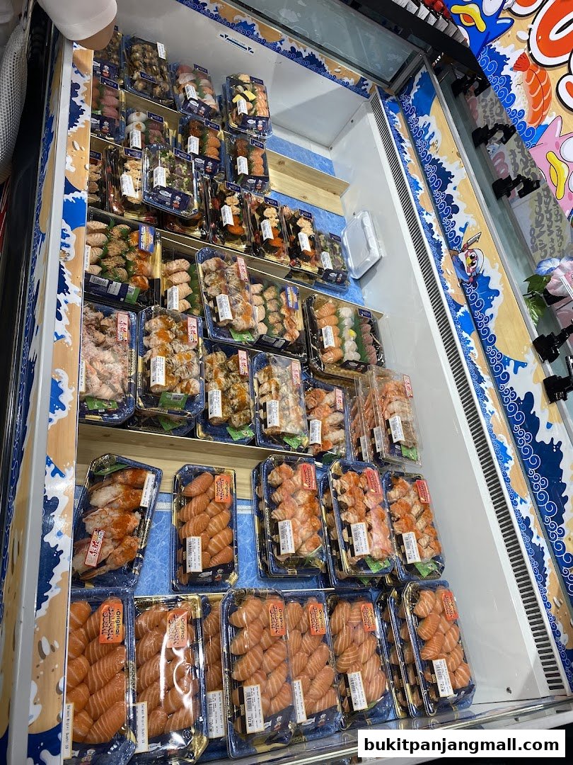 A display refrigerator filled with various pre-packaged sushi and seafood items.