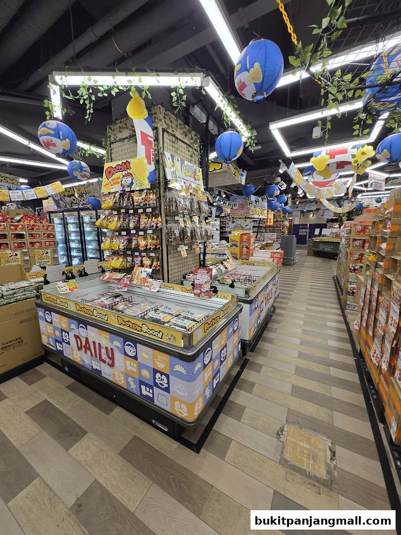 Interior view of a DON DON DONKI store with aisles of products and decorative lanterns.