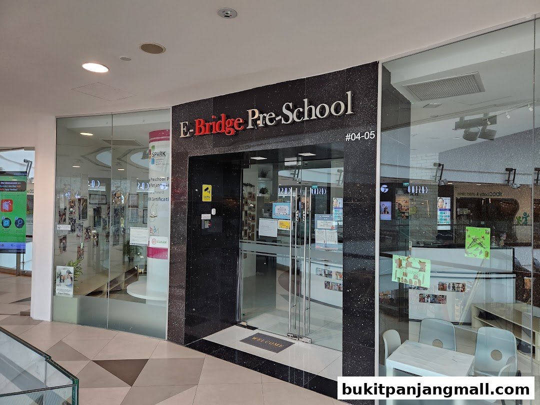 The entrance of E-Bridge Pre-School, a modern educational facility with a welcoming ambiance.