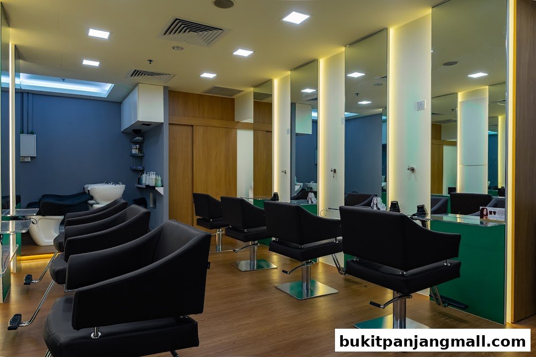 Interior of a modern hair studio with black styling chairs and mirrors.