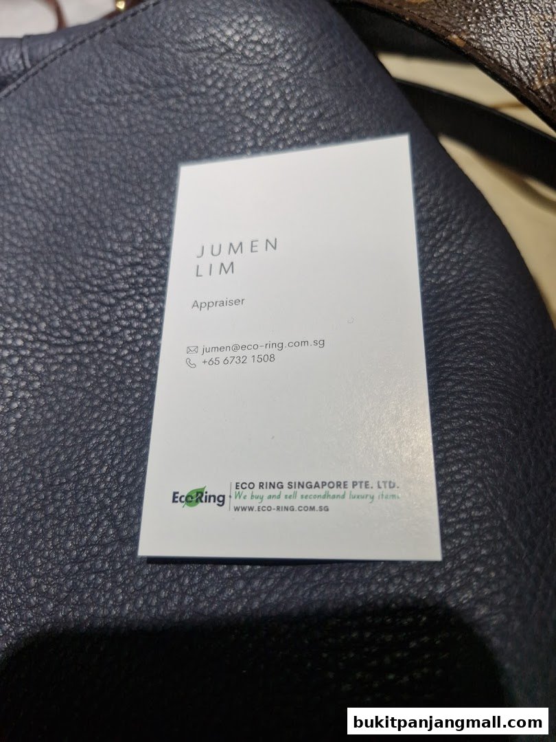 A business card for Jumen Lim, an appraiser at Eco Ring Singapore.