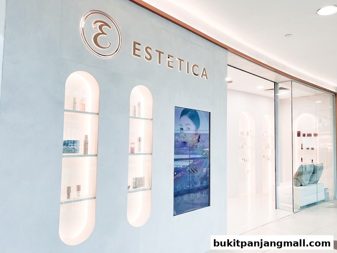 The modern storefront of Estetica Beauty, featuring illuminated shelves and a digital display.