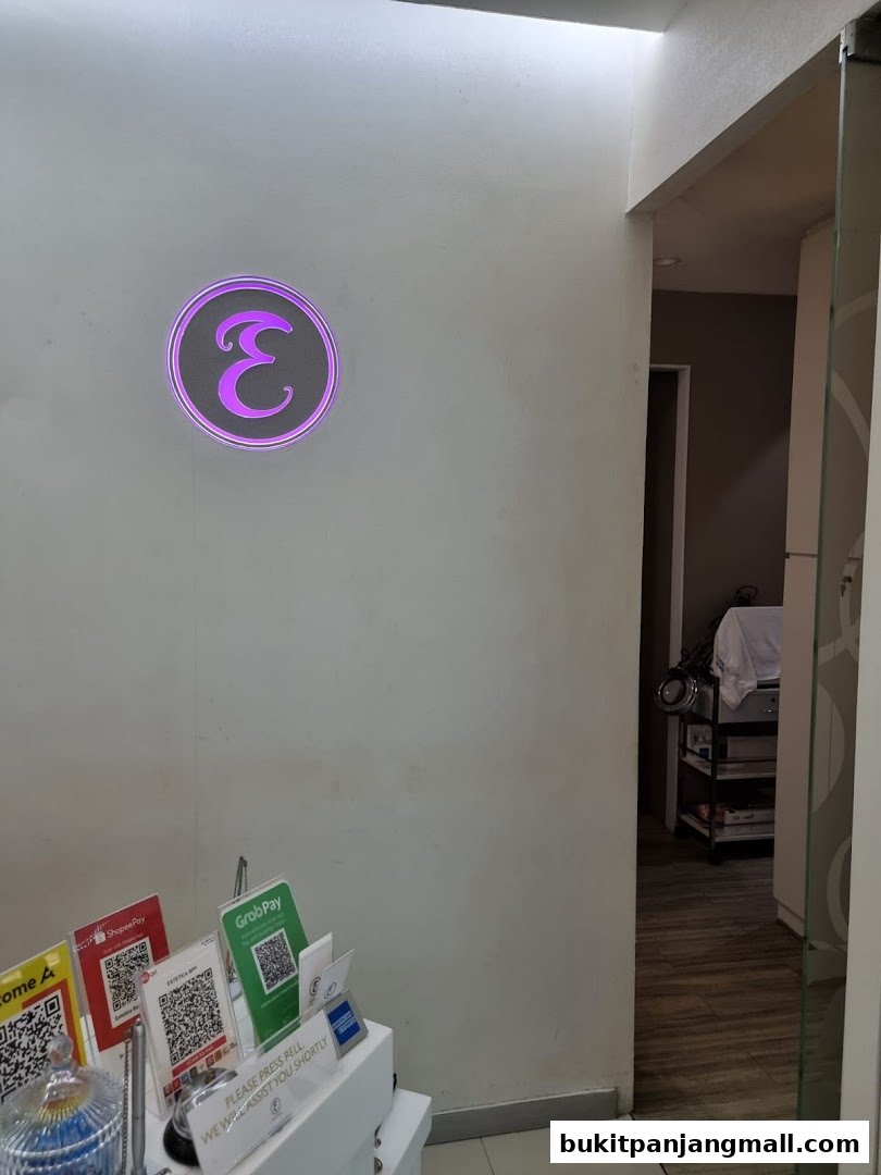 Estetica Beauty shop interior with payment QR codes and a glowing logo.