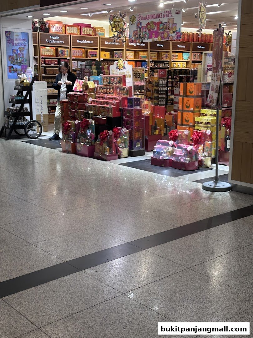 A Eu Yan Sang shop displaying numerous gift baskets and health products.