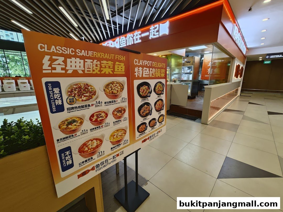 A menu board displays various fish dishes outside a restaurant called Fish With You.