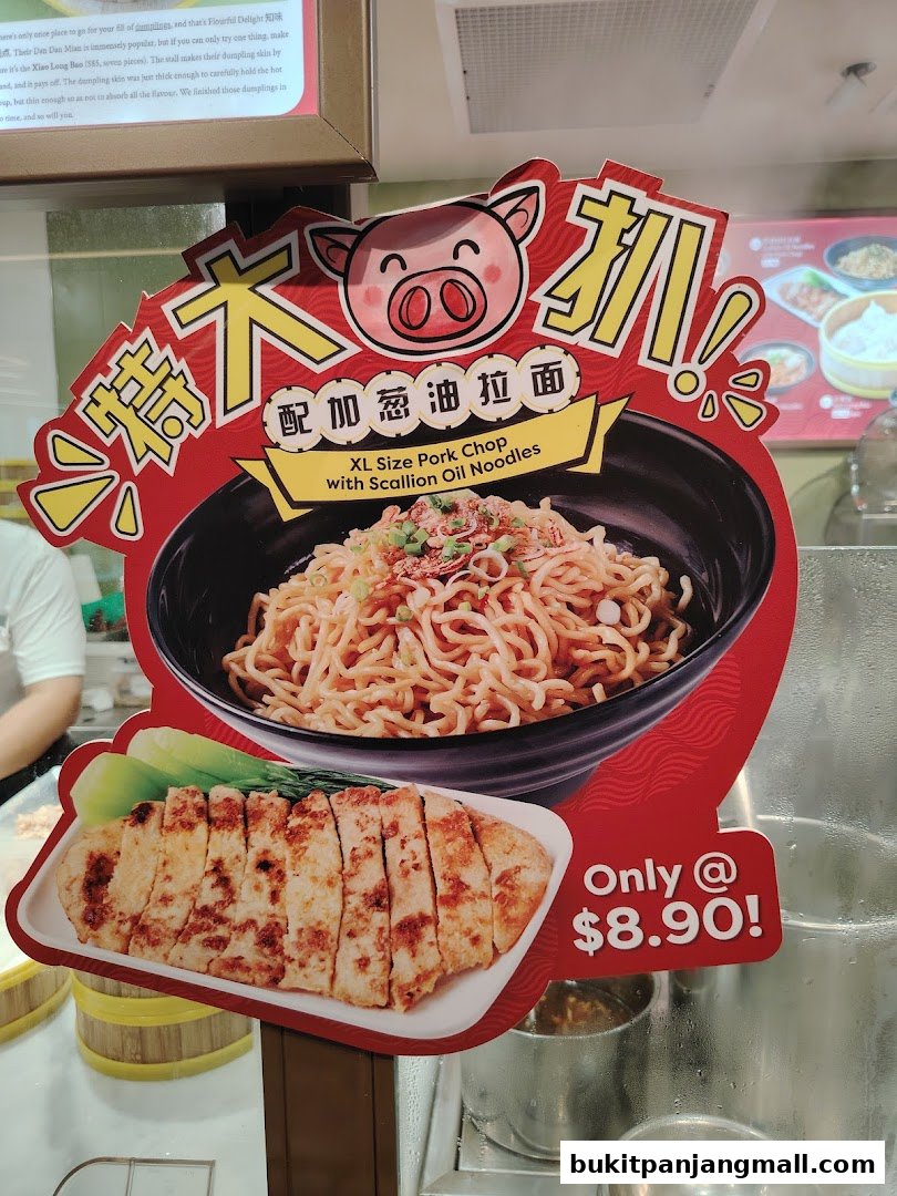 A sign advertising XL Size Pork Chop with Scallion Oil Noodles for $8.90.