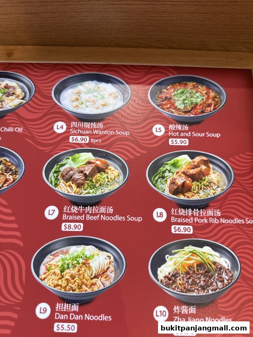 A menu display featuring various noodle soups and wonton soup from Flourful Delight.
