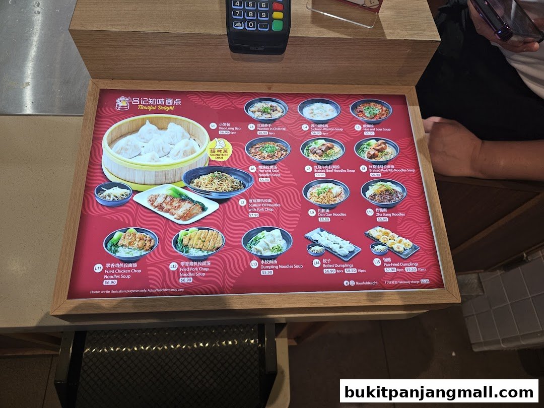A menu board displaying various noodle soups, dumplings, and other Asian dishes with prices.