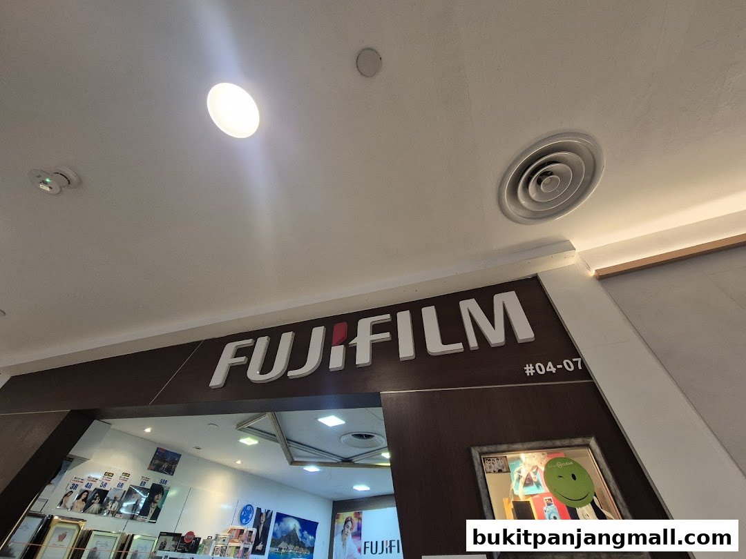 The Fujifilm shop front with its prominent logo and display of photos and cameras.