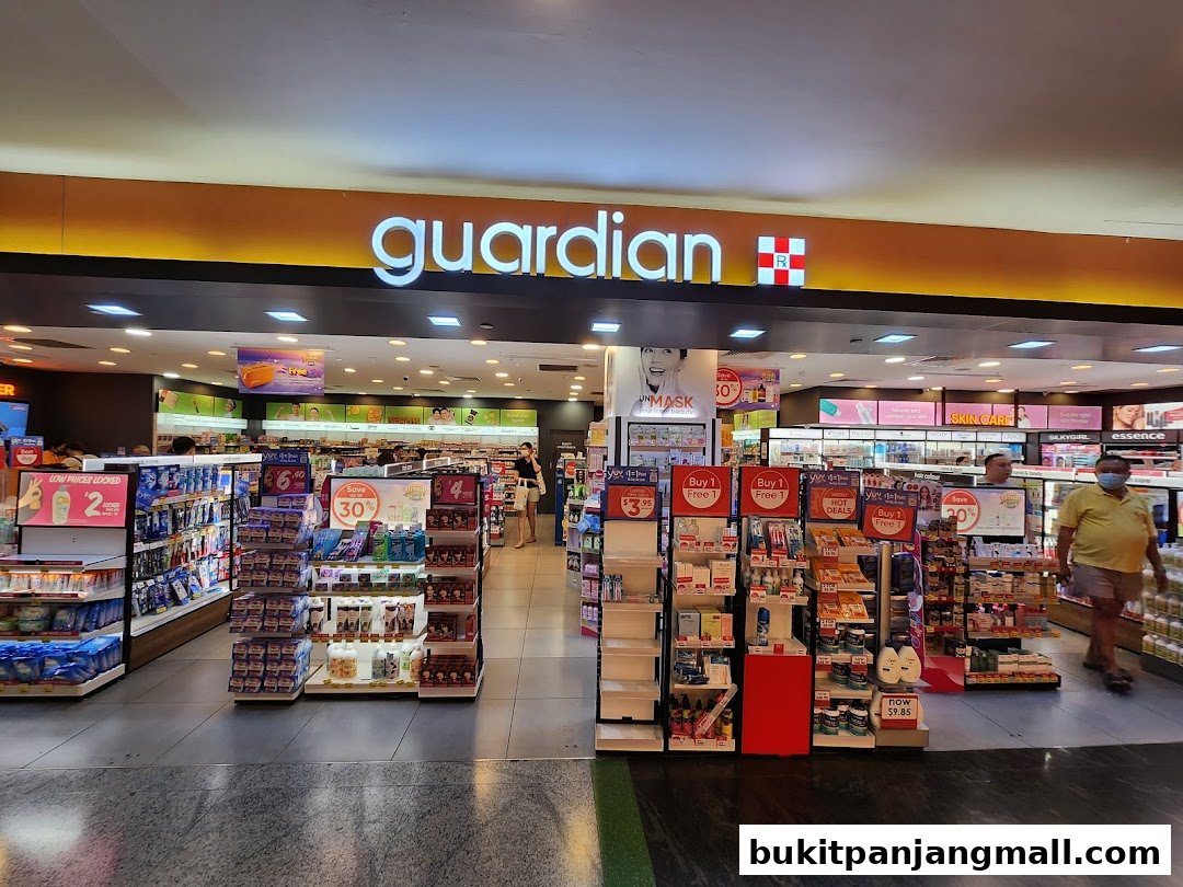 The entrance of a Guardian Health & Beauty store, showcasing various health and beauty products and promotions.