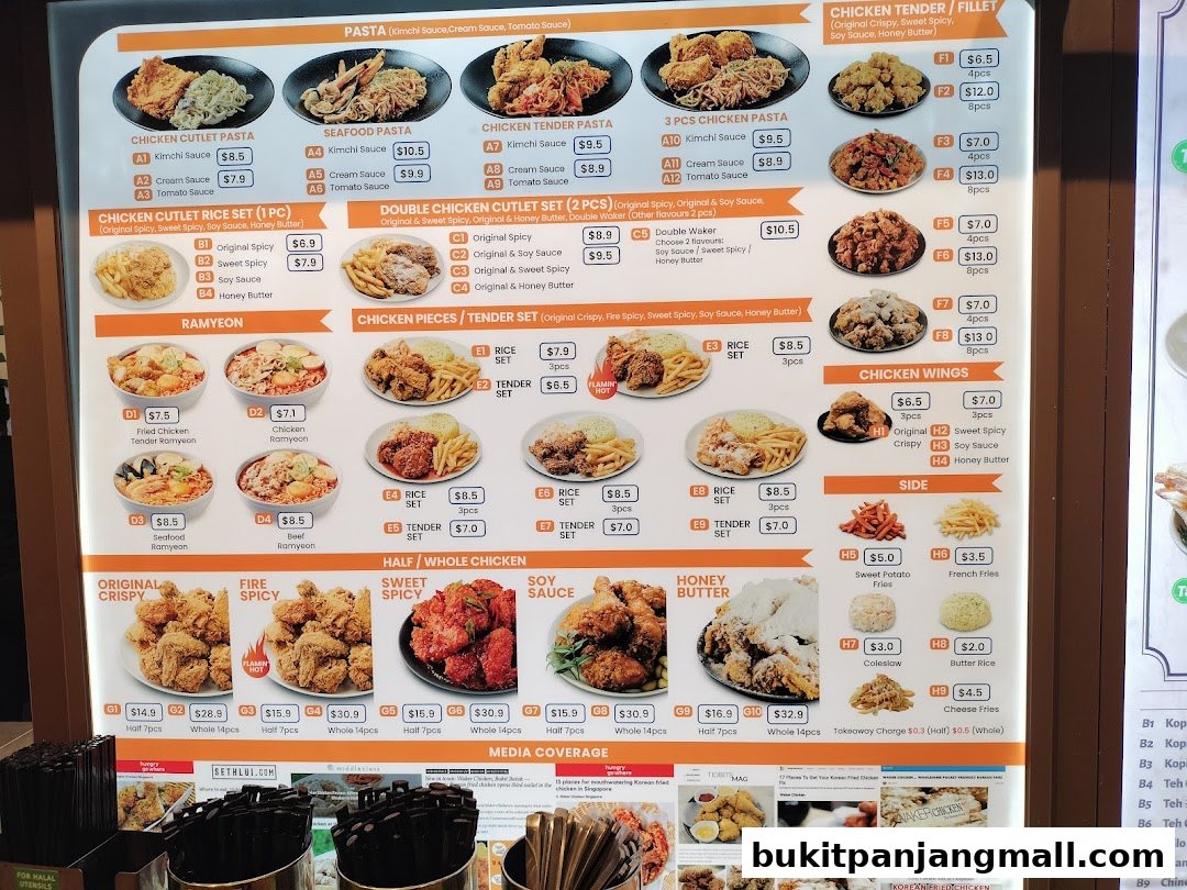 A menu board displaying various Korean fried chicken dishes, pasta, ramyeon, and sides.