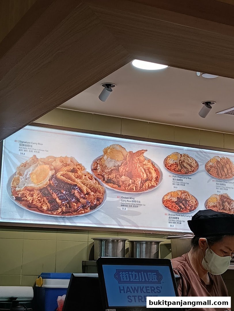 A menu display for Hawkers Street featuring various curry rice dishes with images and prices.