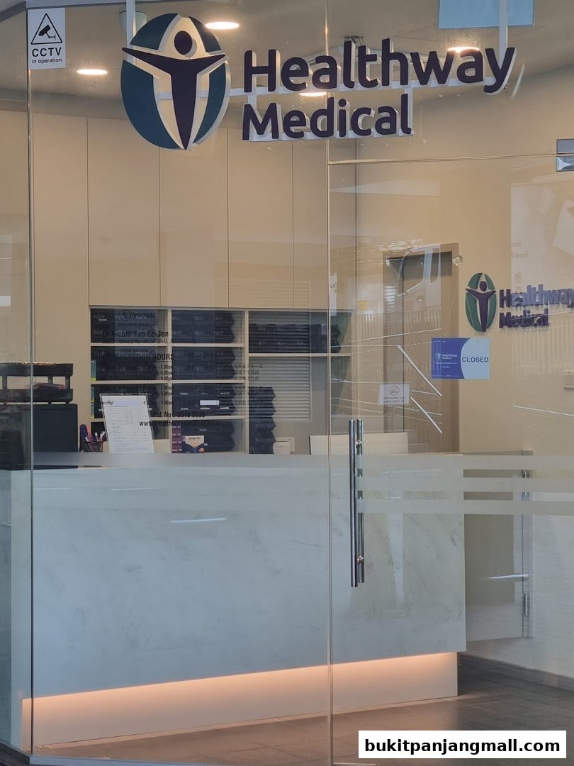 The entrance of Healthway Medical clinic with its logo and operating hours displayed.