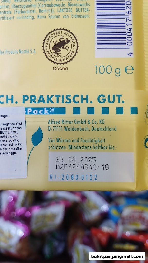 Close-up of product packaging with ingredient list, certifications, and expiration date.