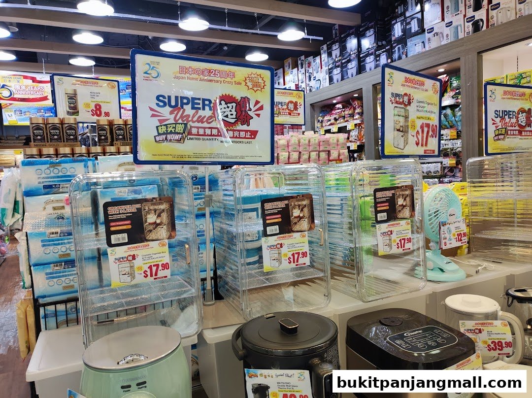 Interior view of a Japan Home store showcasing various household items and promotional signs.