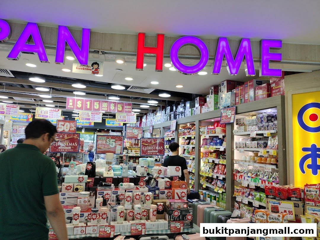 The interior of a Japan Home store, showcasing various products and promotional signs.