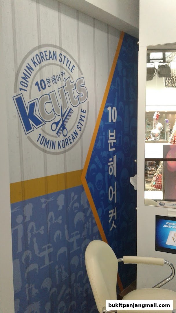 The shop front of Kcuts, a hair salon specializing in 10-minute Korean style haircuts.
