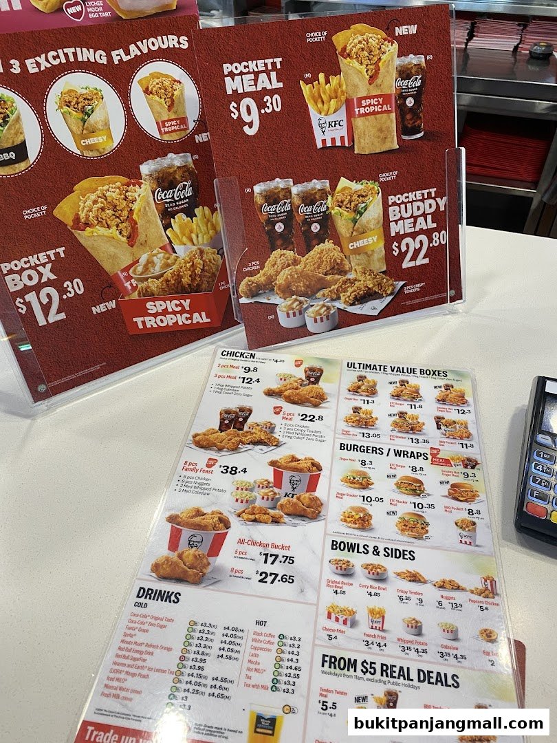 A KFC menu displaying various chicken meals, burgers, bowls, sides, and drinks.