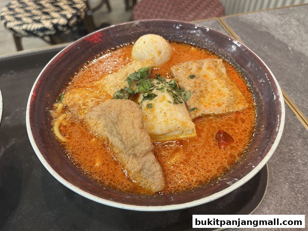A close-up shot of a delicious bowl of Laksa from Koo Kee.