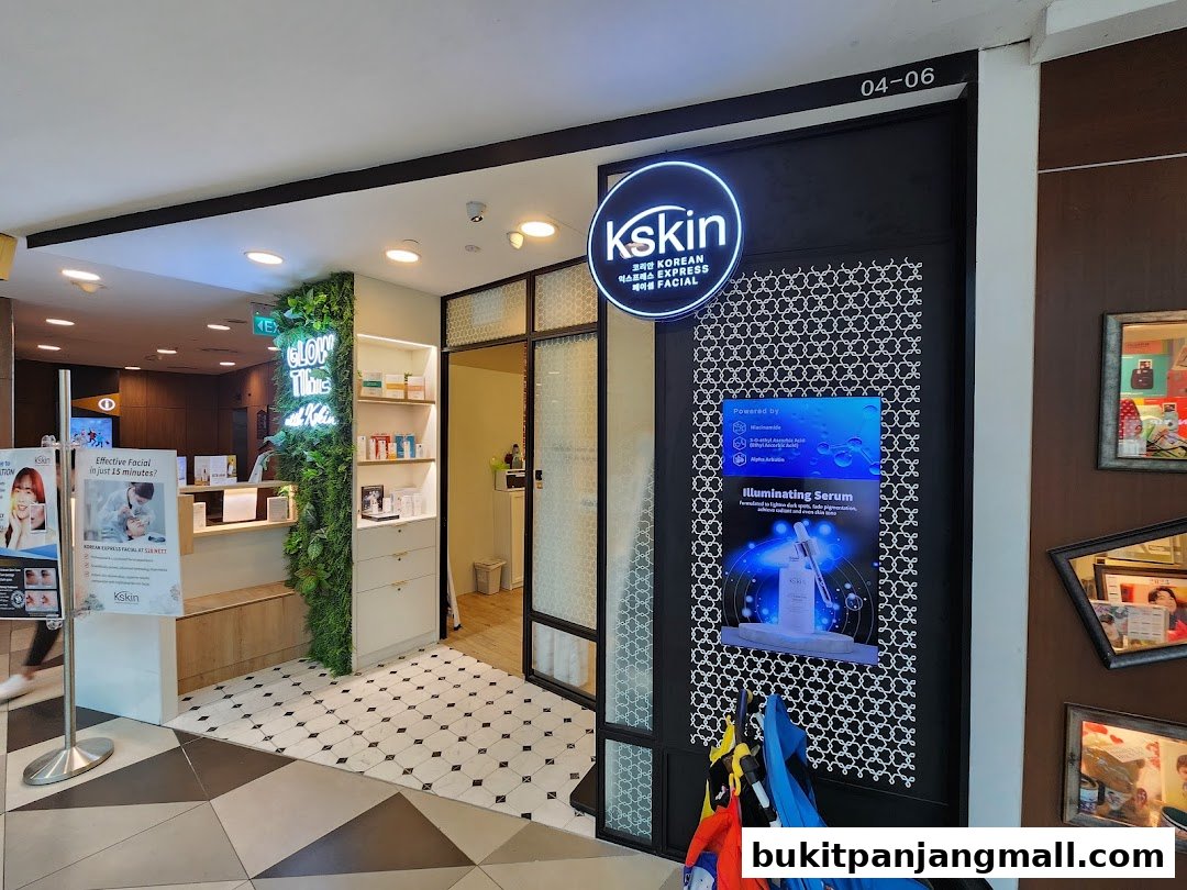 The entrance to Kskin Korean Express Facial, featuring a glowing sign and product displays.