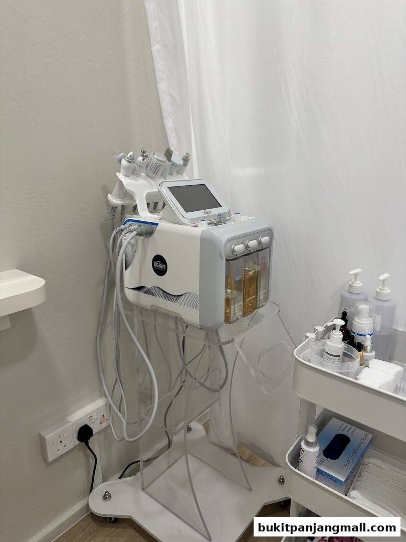 A Kskin Korean Express Facial machine with various attachments and skincare products.