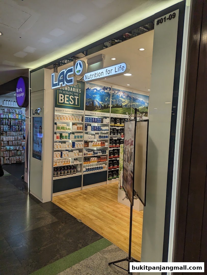 The entrance of LAC Nutrition for Life, a health supplement store, showcasing various products.