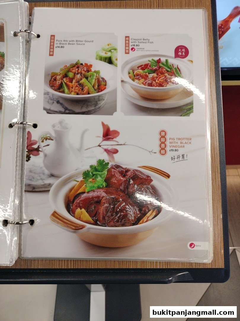 A menu page from Lao Huo Tang featuring three popular Chinese dishes with photos and prices.
