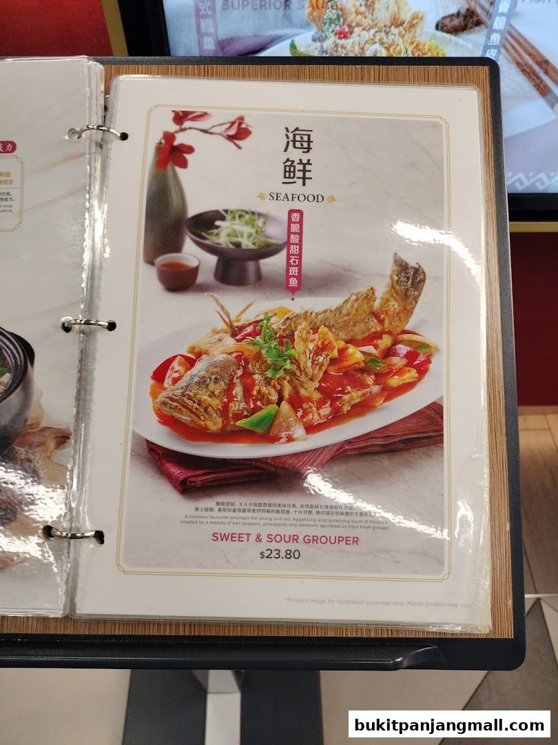 A menu page featuring a delicious-looking Sweet & Sour Grouper dish.