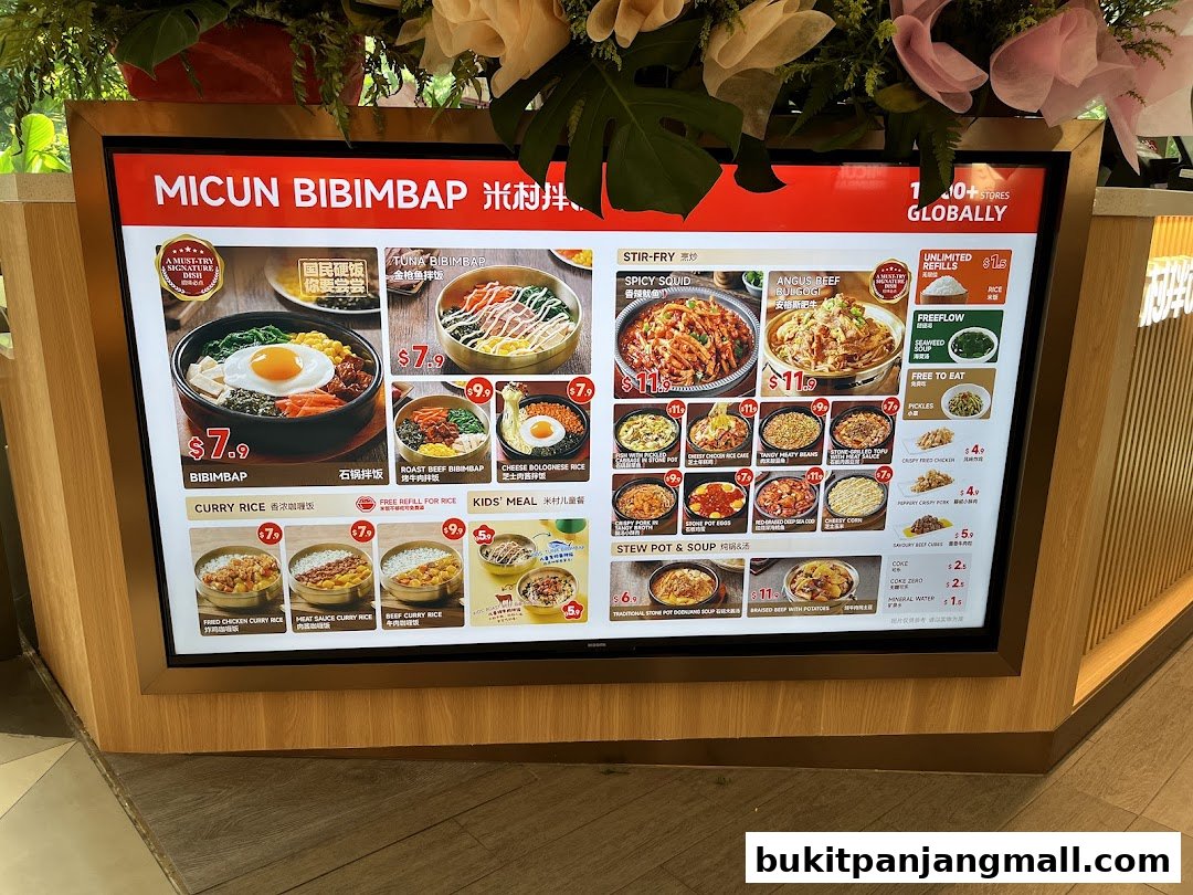 A digital menu board displays various Korean dishes from Micun Bibimbap.