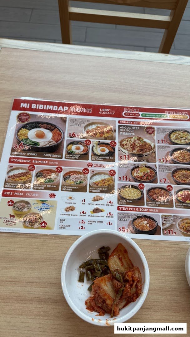 A menu from Mi Bibimbap featuring various Korean dishes with prices and images.