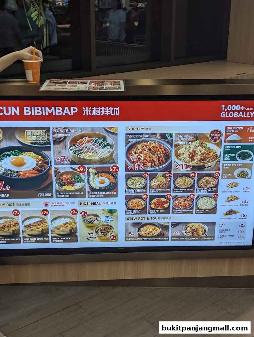 A digital menu board displaying various Korean dishes from Micun Bibimbap.