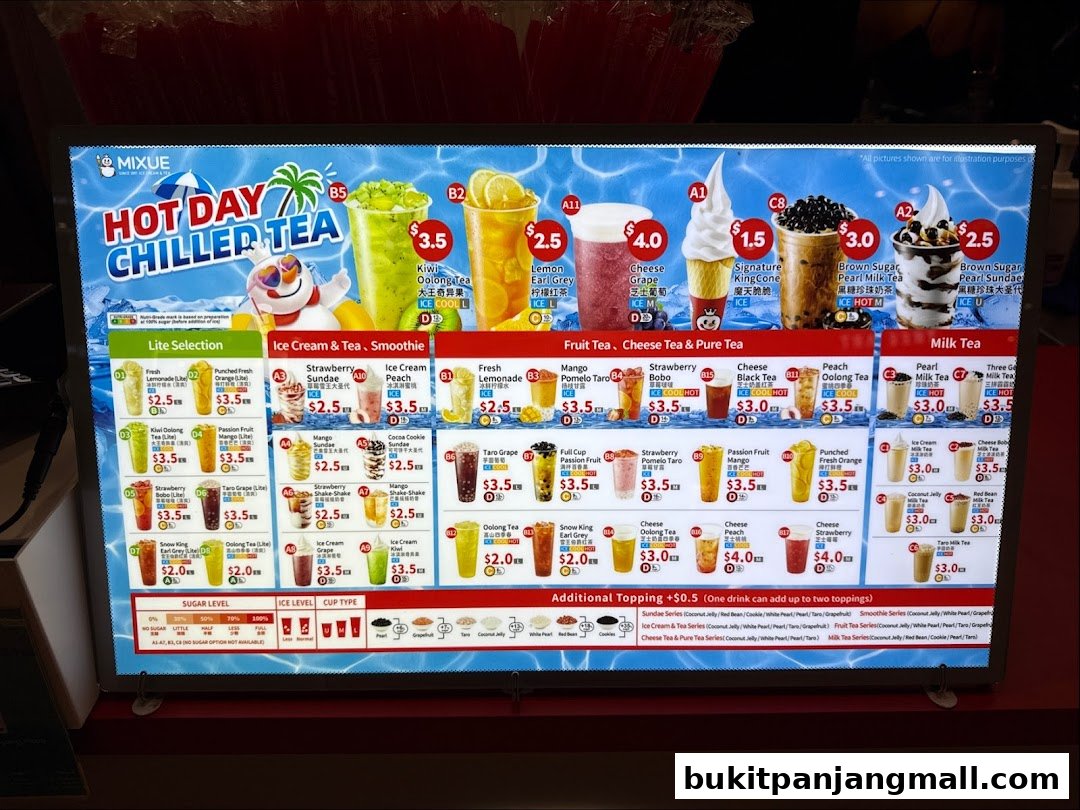 A brightly lit menu board displaying a variety of chilled teas, ice creams, and smoothies from MIXUE.