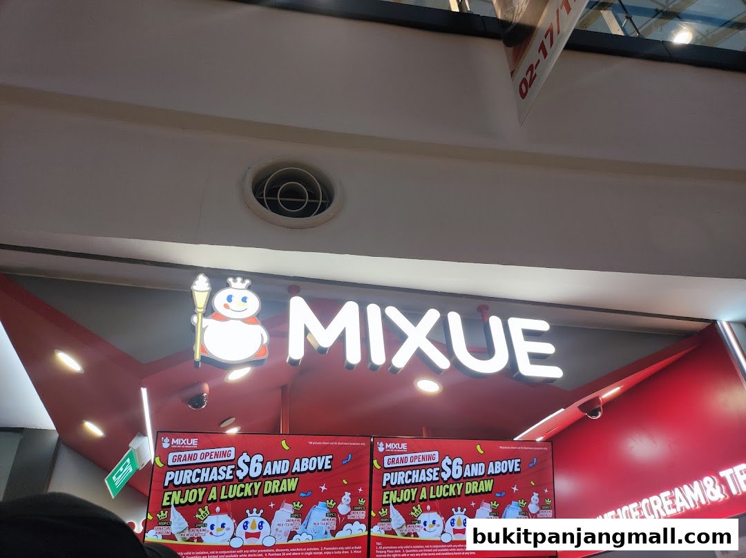 The MIXUE shop front with its iconic mascot and a grand opening promotion.
