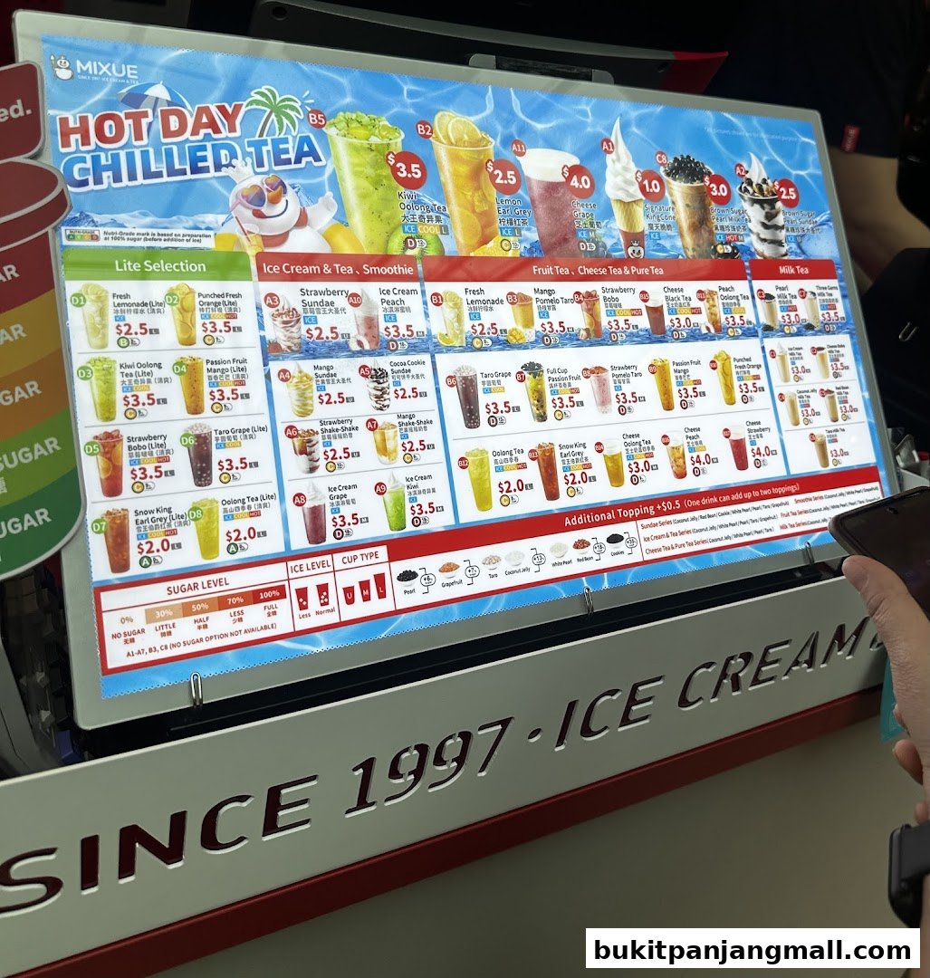 A digital menu board displaying various chilled teas, ice creams, and smoothies with prices.